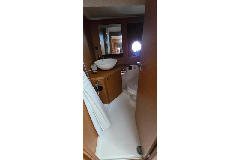 Slide: The Image of Bathroom interior of 2021 Beneteau Swift Trawler 41 Fly with modern fixtures. - 10