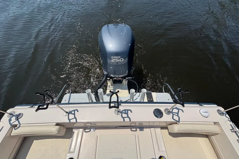 Slide: The Image of 1999 Grady-White Tournament 225 boat with Yamaha 250 outboard motor on water. - 18