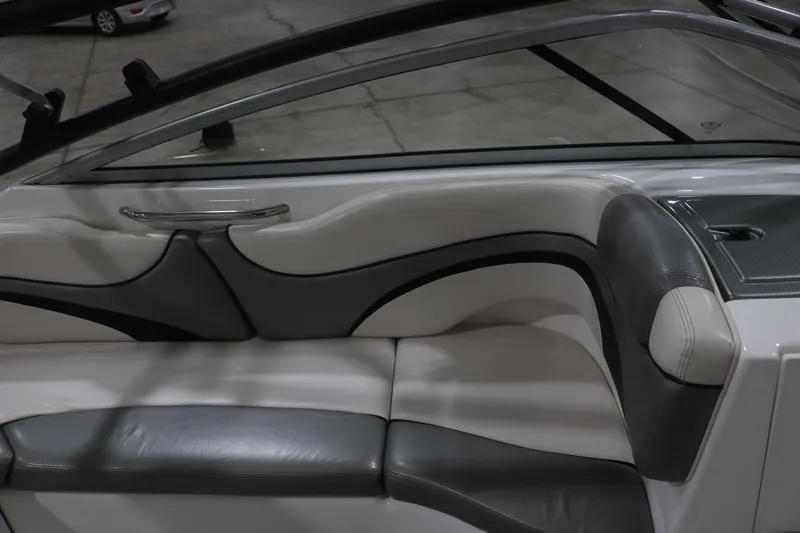 Slide: The Image of 2009 Yamaha Boats 212X interior seating with sleek design and comfortable upholstery. - 14