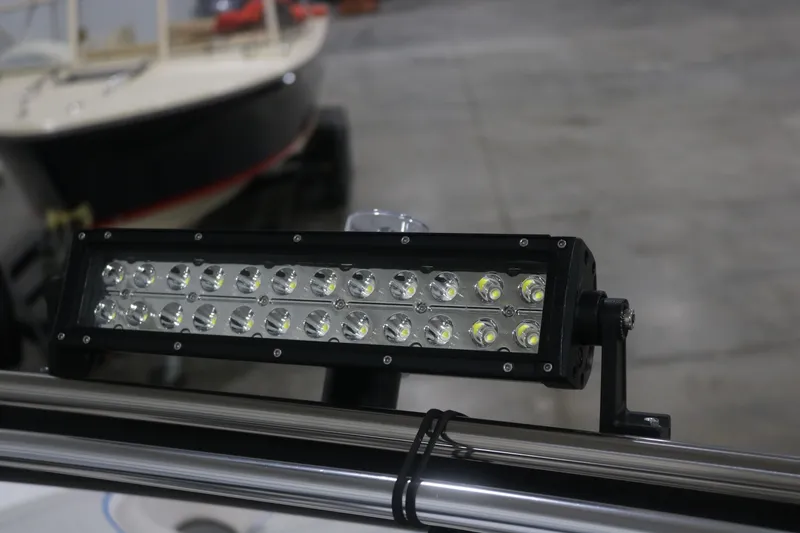 Slide: The Image of LED light bar on a 2009 Yamaha Boats 212X in a garage setting. - 24