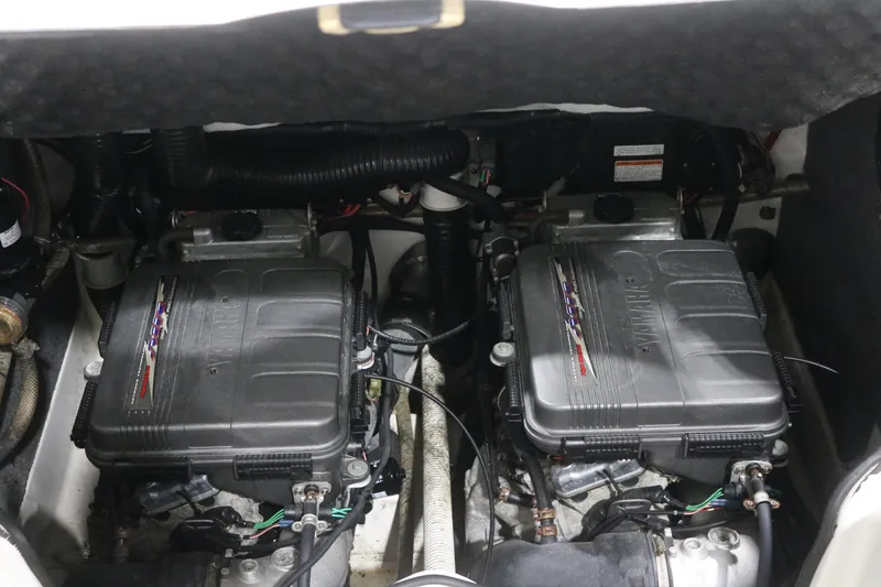 Slide: The Image of 2009 Yamaha Boats 212X engine compartment with dual engines and wiring. - 9