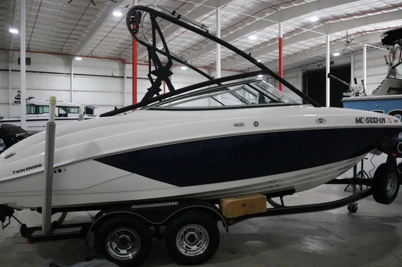 Slide: The Image of 2009 Yamaha Boats 212X on trailer in indoor storage facility. - 2