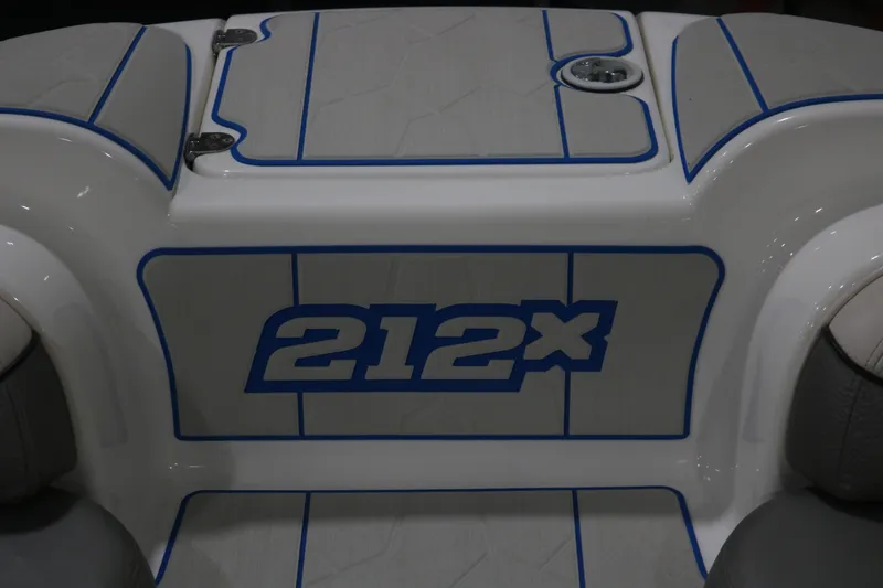 Slide: The Image of 2009 Yamaha Boats 212X interior with blue accents and logo detailing. - 23