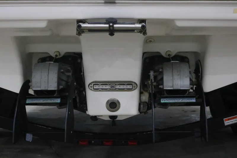 Slide: The Image of Rear view of a 2009 Yamaha Boats 212X, showcasing dual jet propulsion system. - 30