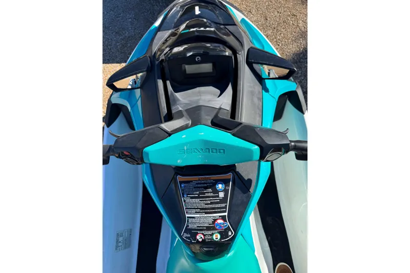 Slide: The Image of 2022 Sea-Doo GTI SE 130 jet ski, top view, teal color, handlebars visible. - 9