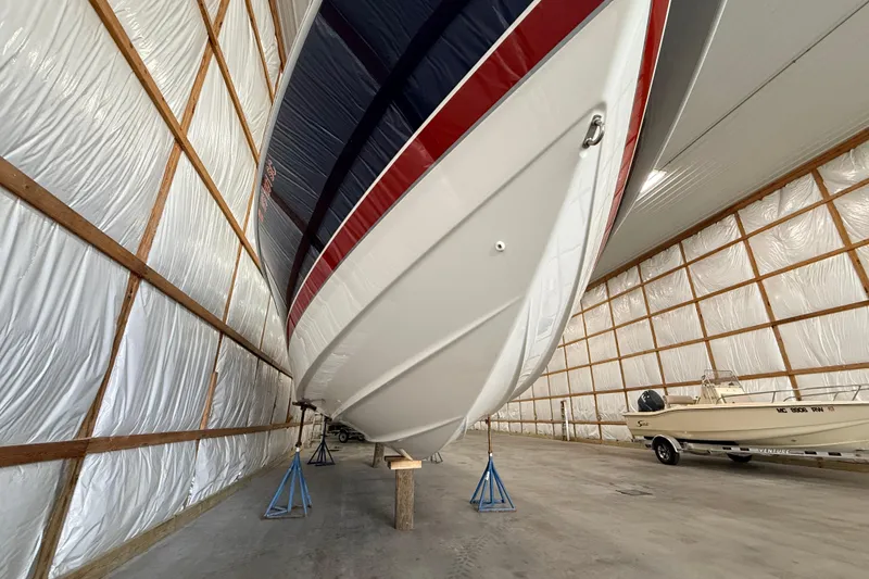 Slide: The Image of 2017 Formula 350 Crossover Bowrider OB stored indoors on stands. - 6