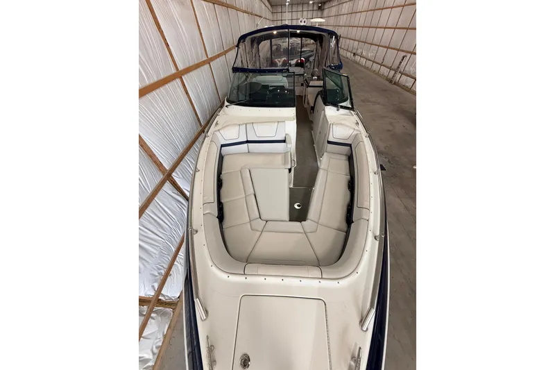 Slide: The Image of 2017 Formula 350 Crossover Bowrider OB in storage, showcasing spacious seating and sleek design. - 30