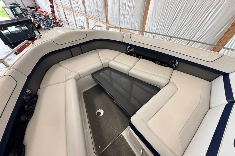 Slide: The Image of 2017 Formula 350 Crossover Bowrider OB interior with spacious seating and sleek design. - 27