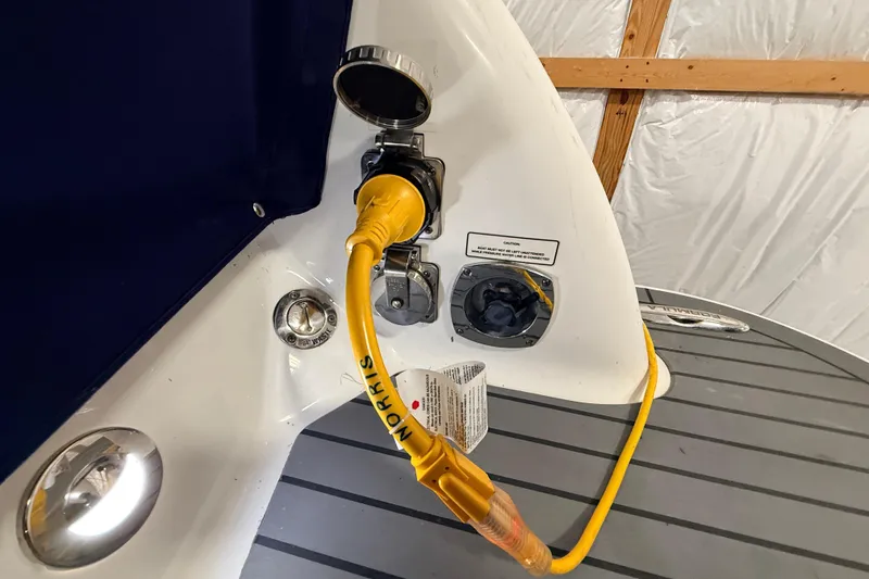 Slide: The Image of 2017 Formula 350 Crossover Bowrider OB with yellow power cable connection. - 47