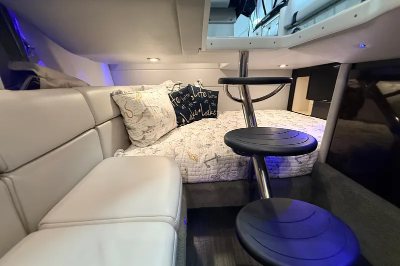 Slide: The Image of Interior cabin of 2017 Formula 350 Crossover Bowrider OB with cozy seating and bedding. - 37