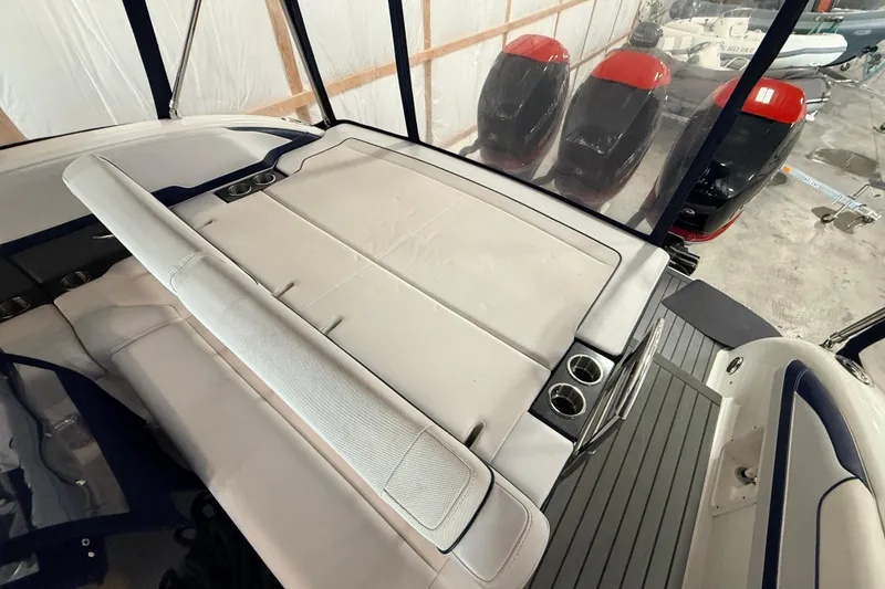 Slide: The Image of 2017 Formula 350 Crossover Bowrider OB interior with seating and cup holders. - 44