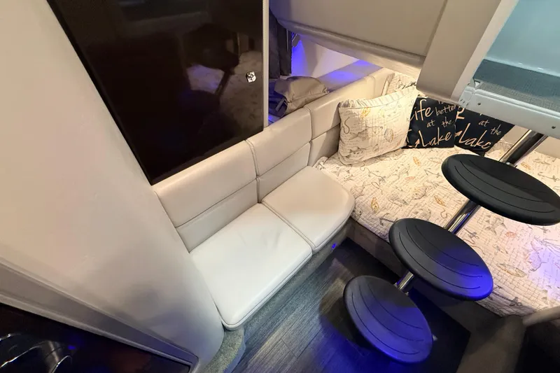 Slide: The Image of Interior of 2017 Formula 350 Crossover Bowrider OB with plush seating and decorative pillows. - 38