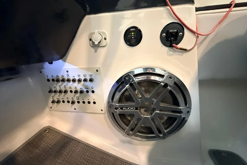 Slide: The Image of Control panel and JL Audio speaker on 2017 Formula 350 Crossover Bowrider OB. - 17
