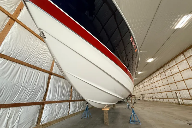 Slide: The Image of 2017 Formula 350 Crossover Bowrider OB stored indoors on stands. - 7