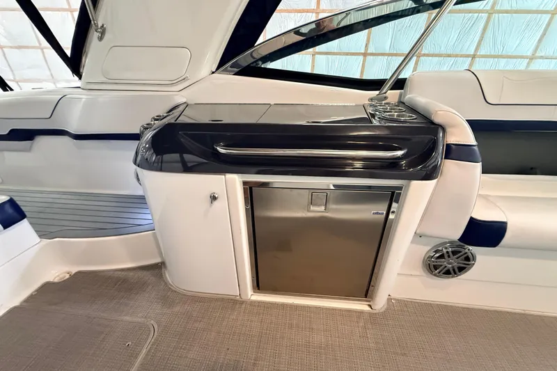 Slide: The Image of 2017 Formula 350 Crossover Bowrider OB interior with sleek seating and built-in amenities. - 22
