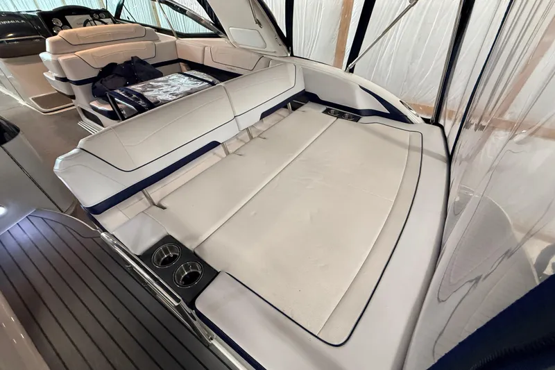 Slide: The Image of 2017 Formula 350 Crossover Bowrider OB interior with spacious seating and cup holders. - 45