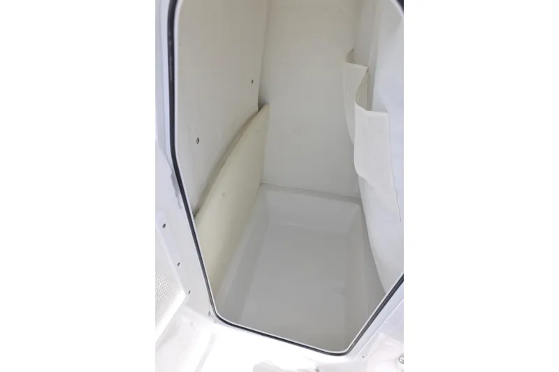Slide: The Image of Interior storage compartment of 2027 Sea Hunt Ultra 219 boat. - 16