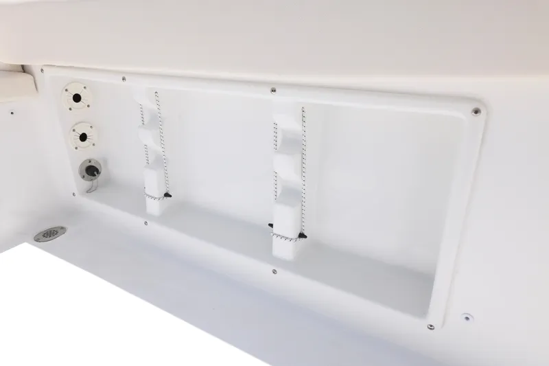 Slide: The Image of Interior view of a 2027 Sea Hunt Ultra 219 boat, showcasing storage compartments. - 22