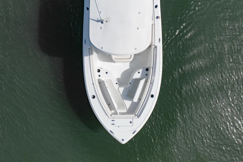 Slide: The Image of Top view of 2027 Sea Hunt Ultra 219 boat on water. - 36
