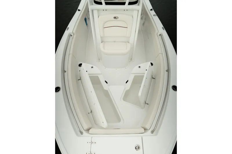 Slide: The Image of 2027 Sea Hunt Ultra 219 boat interior with seating and storage compartments. - 40