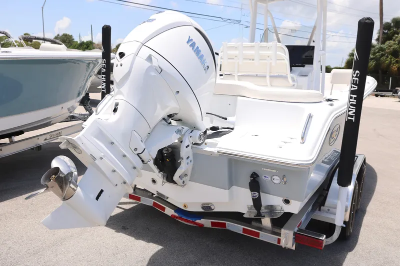 Slide: The Image of 2027 Sea Hunt Ultra 219 boat with Yamaha outboard engine on trailer. - 7