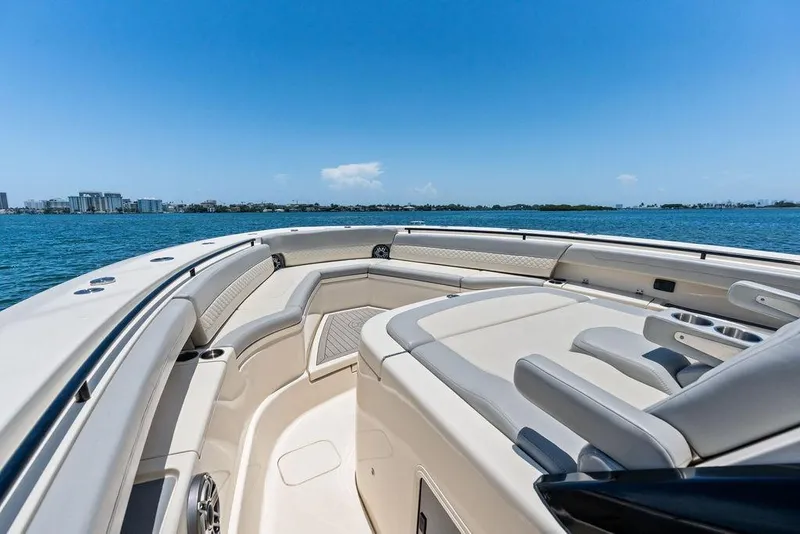 Slide: The Image of Luxurious 2021 Scout 425 LXF boat interior with ocean view and clear blue sky. - 12