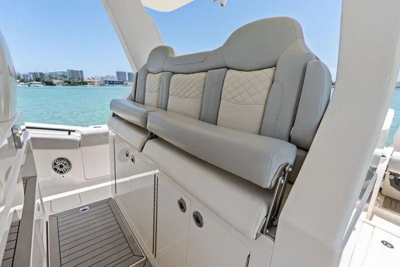 Slide: The Image of Luxurious seating on 2021 Scout 425 LXF boat with ocean view. - 31