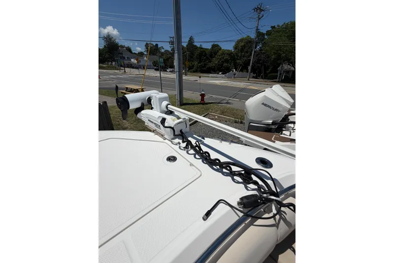 Slide: The Image of 2016 Boston Whaler 280 Outrage boat with Minn Kota trolling motor on deck. - 12