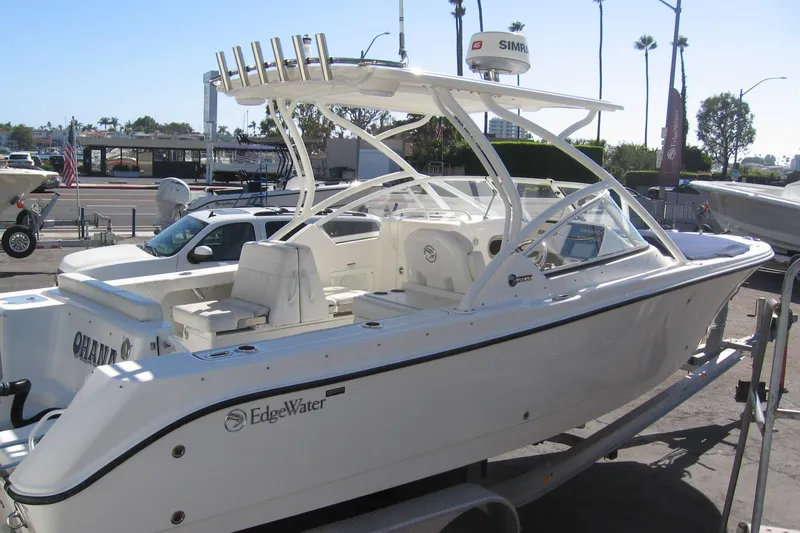 Slide: The Image of 2019 Edgewater 248CX Crossover boat on display, featuring sleek design and modern amenities. - 8