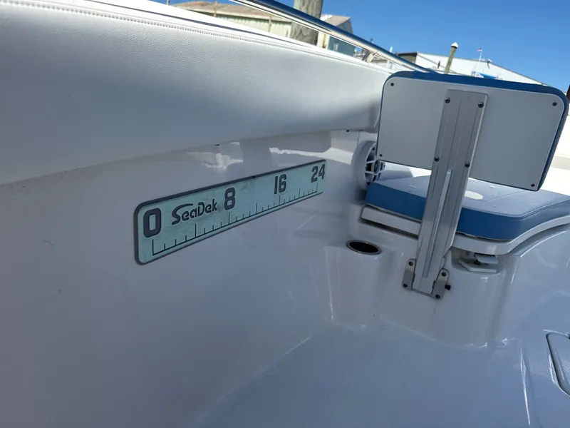 Slide: The Image of The image shows the interior of a boat with a ruler on the side. - 13