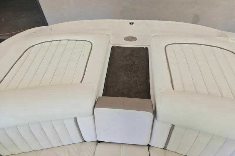 Slide: The Image of White leather seating on a 2005 Cobalt 250 boat. - 10