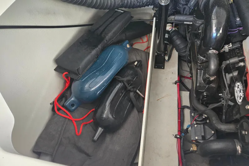 Slide: The Image of Boat engine compartment with fenders and equipment, Cobalt 250, 2005 model. - 15