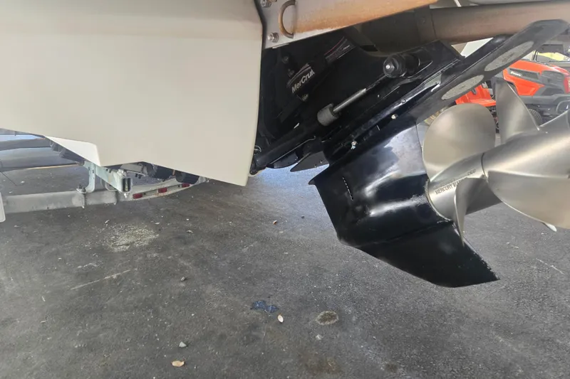 Slide: The Image of 2005 Cobalt 250 boat propeller and stern drive on a trailer. - 4