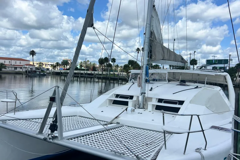 Slide: The Image of Sailing yacht Admiral 40 Cruiser, 2008 model, docked at a marina under a cloudy sky. - 6