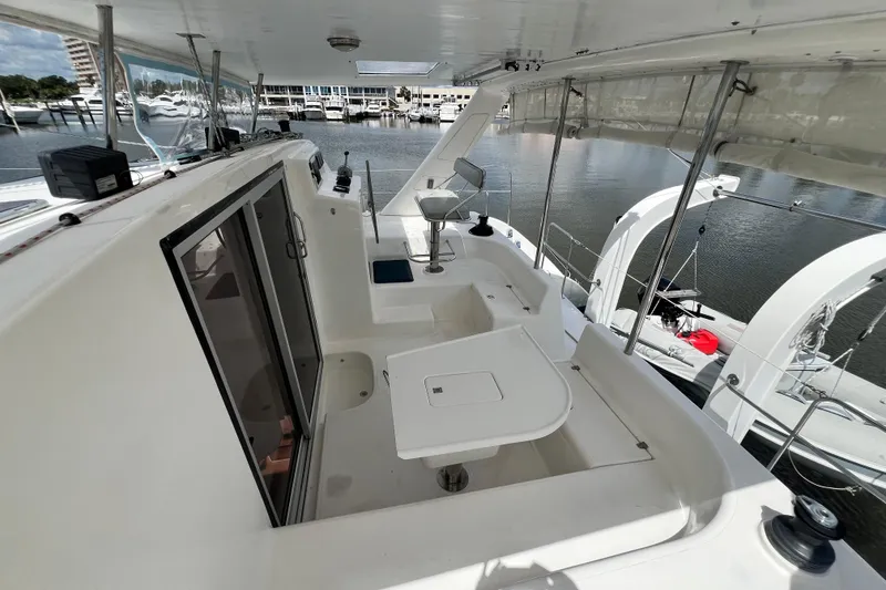 Slide: The Image of Cockpit view of 2008 Admiral 40 Cruiser yacht docked at marina. - 18