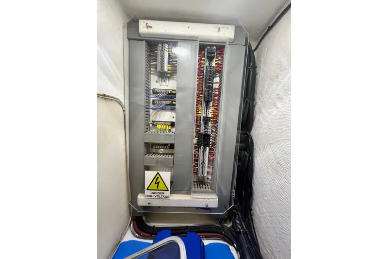 Slide: The Image of Electrical panel with high voltage warning in 2008 Admiral 40 cruiser yacht. - 57