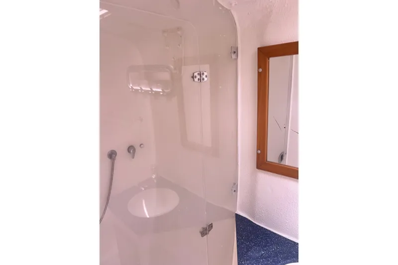 Slide: The Image of Bathroom interior of 2008 Admiral 40 Cruiser yacht with shower and mirror. - 84