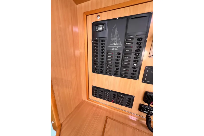 Slide: The Image of Electrical panel of a 2008 Admiral 40 Cruiser yacht with wooden interior. - 50