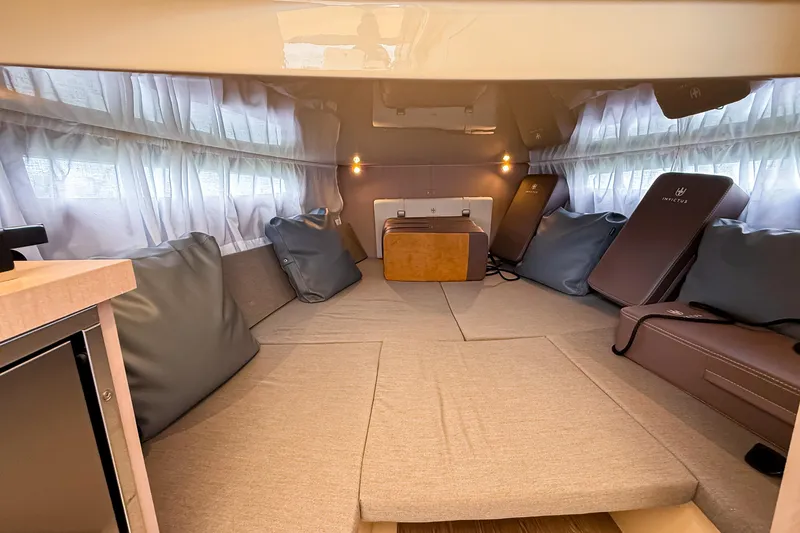 Slide: The Image of Luxurious interior of 2023 Invictus GT280S boat with comfortable seating and ambient lighting. - 24
