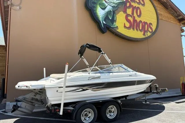 Slide: The Image of 2006 Seaswirl 190 Bowrider I/O boat on trailer outside Bass Pro Shops. - 4