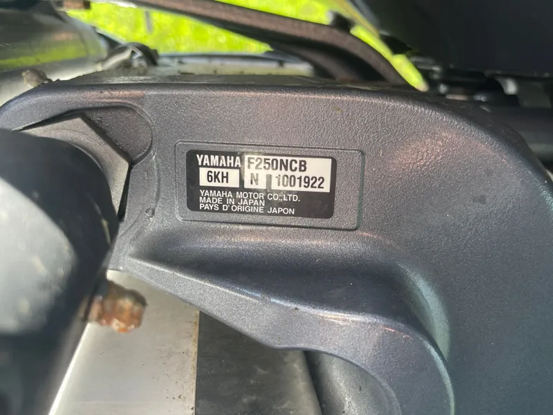 Slide: The Image of Close-up of a Yamaha F250NCB engine in a 2023 Chaparral 280OSX boat. - 14