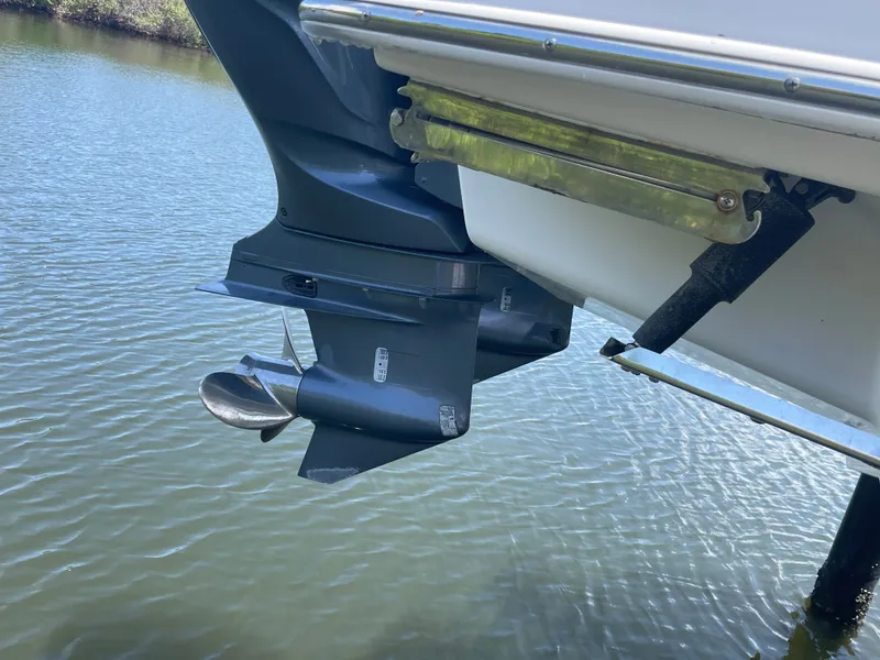Slide: The Image of Outboard motor of a 2023 Chaparral 280OSX boat in the water. - 12
