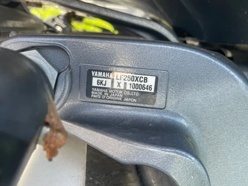 Slide: The Image of Close-up of a Yamaha engine part with serial number and country of origin. - 15
