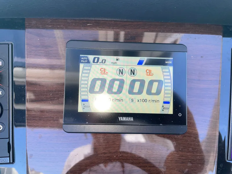 Slide: The Image of Yamaha display on a Chaparral 280OSX boat, showing speed and engine data. - 48