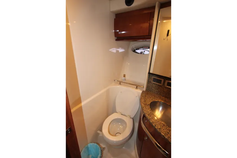 Slide: The Image of Luxurious bathroom in 2005 Sea Ray 420 Sundancer yacht with granite countertop. - 24