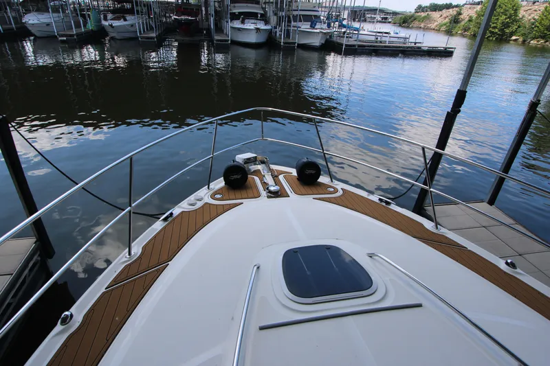 Slide: The Image of Bow view of 2005 Sea Ray 420 Sundancer docked at marina. - 9