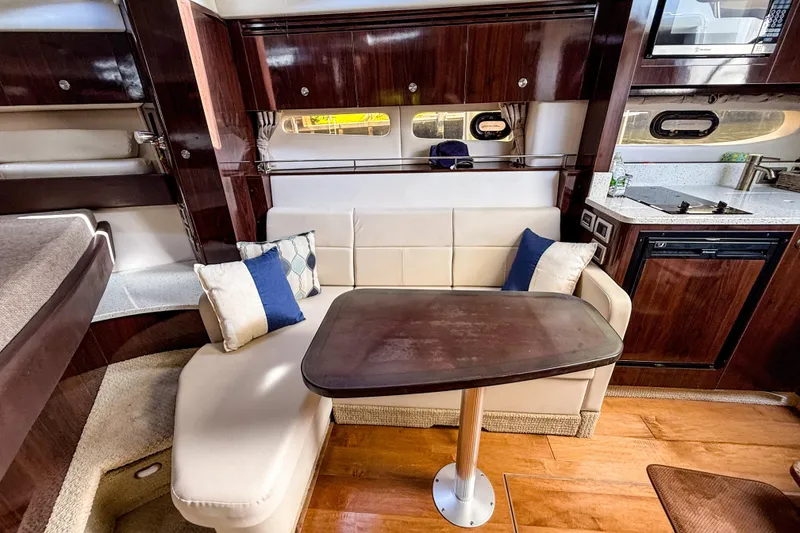 Slide: The Image of Luxurious interior of 2016 Sea Ray Sundancer 350 yacht with elegant seating and modern amenities. - 31