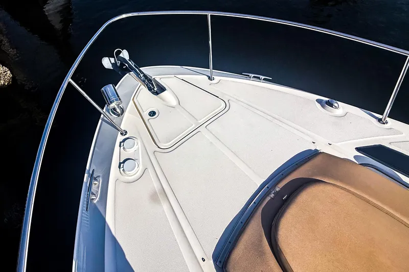 Slide: The Image of Bow of 2016 Sea Ray Sundancer 350 yacht with sleek design and stainless steel railings. - 39