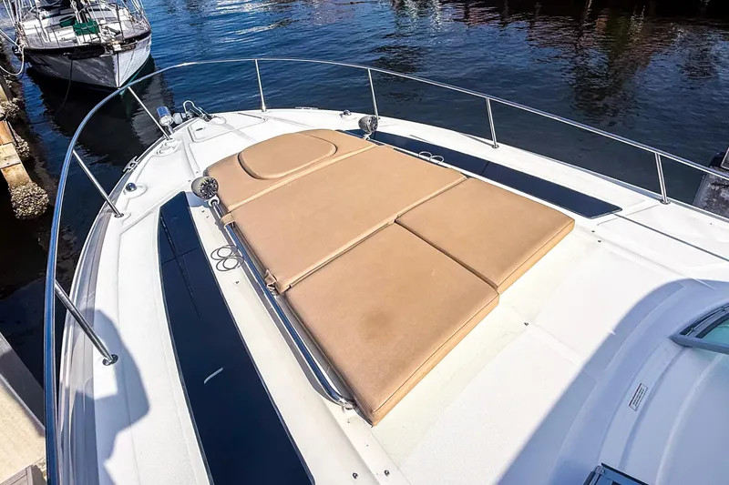 Slide: The Image of 2016 Sea Ray Sundancer 350 yacht with sunpad, docked in marina. - 36