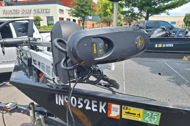 Slide: The Image of Trolling motor on a boat trailer at Tracker Boat Center parking lot. - 4